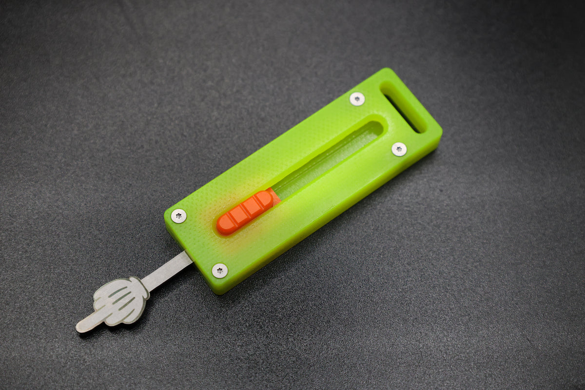 Green G10 with Orange Button - Middle Finger Fidget